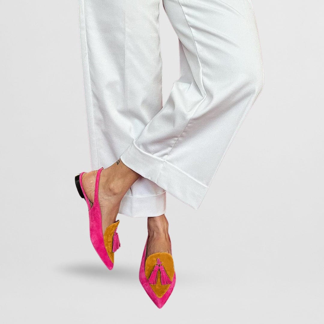 Ballerine slingback con punta a punta e dettagli a frange con nappine