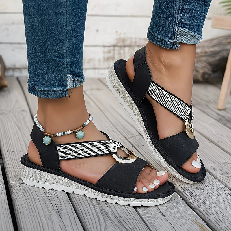 Ortopedisk sandal med vävd elastisk rem