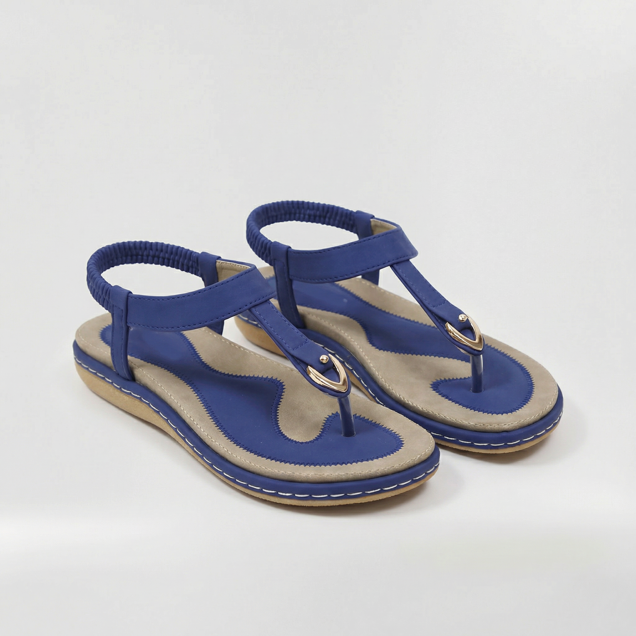 Sandales plates pour femmes à bride en T, bride élastique à la cheville, tongs avec détail métallique